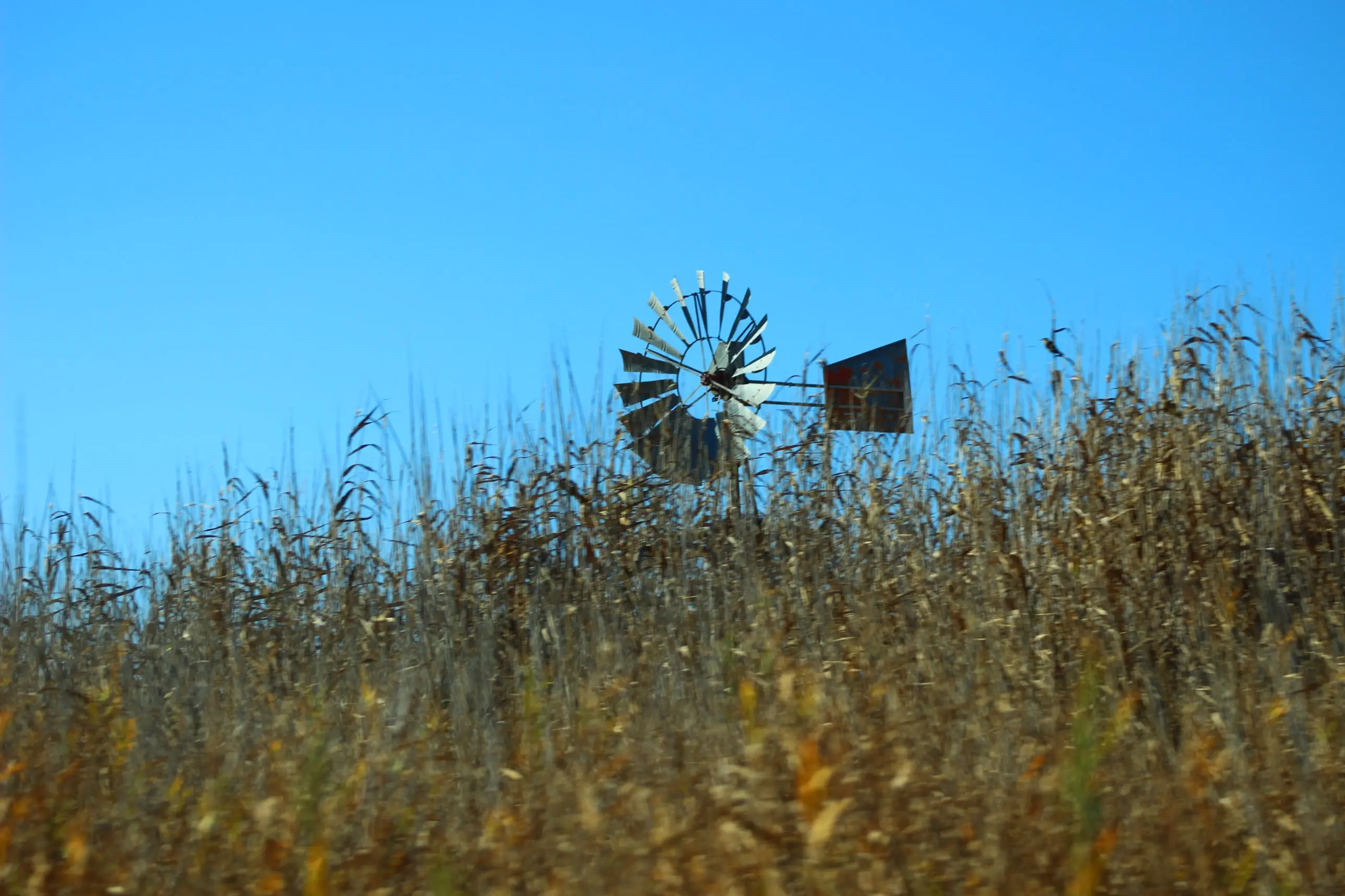 A windmill across open land